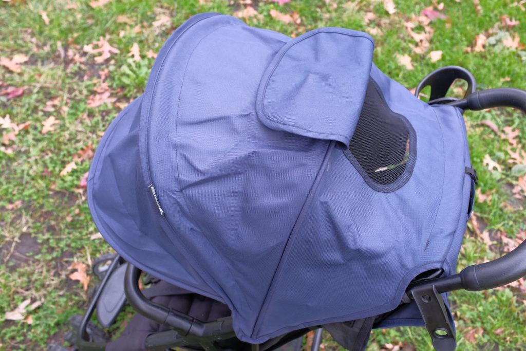 Large navy canopy on a Zoe stroller