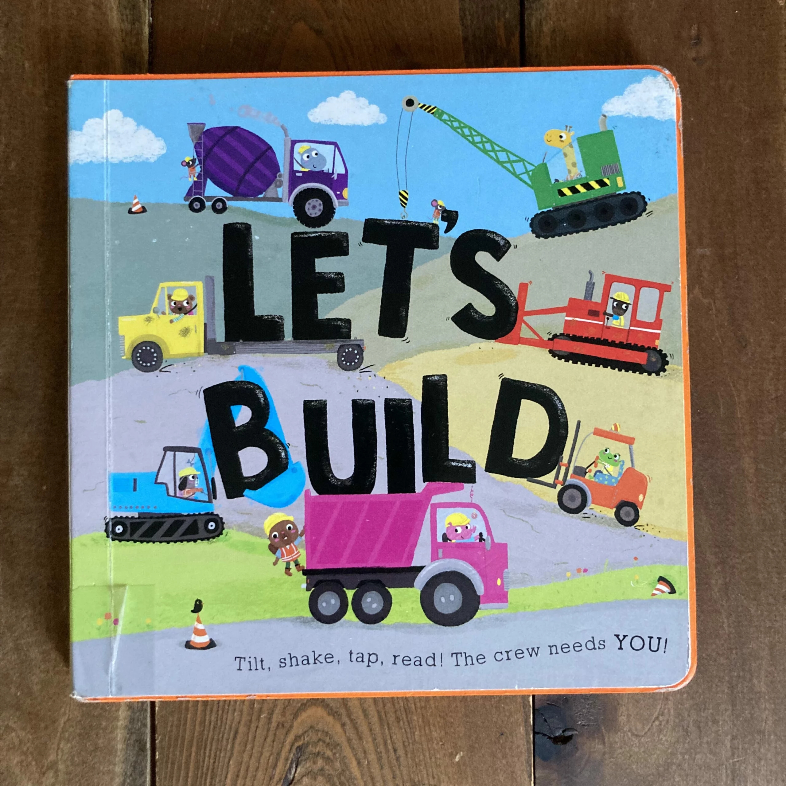 Let's Build cover - interactive toddler construction site book.