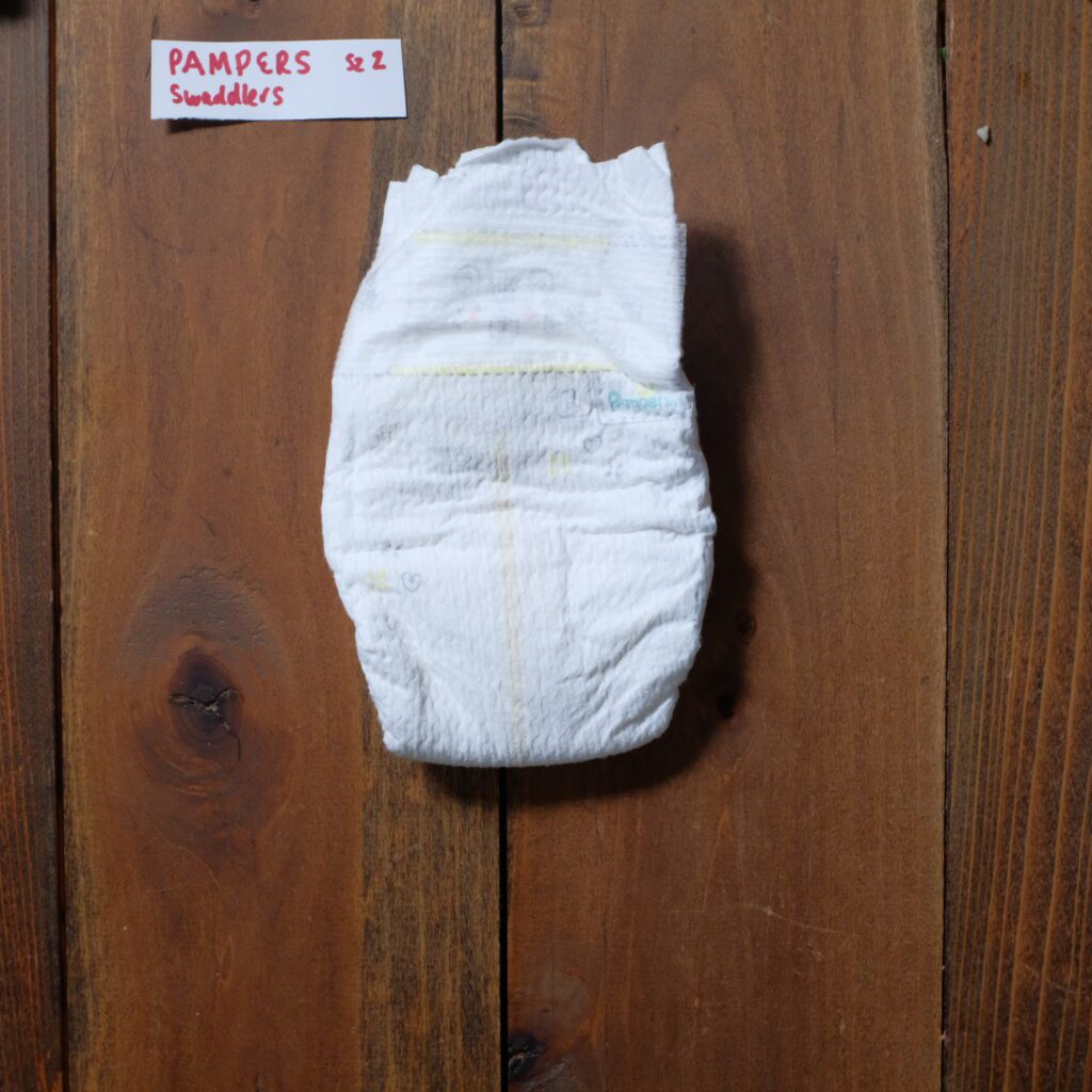 front of a pampers swaddlers diaper