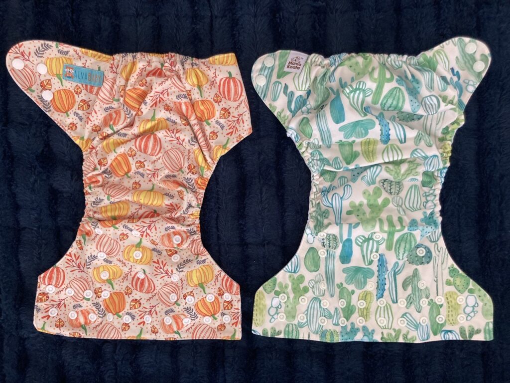 two cloth diapers side by side