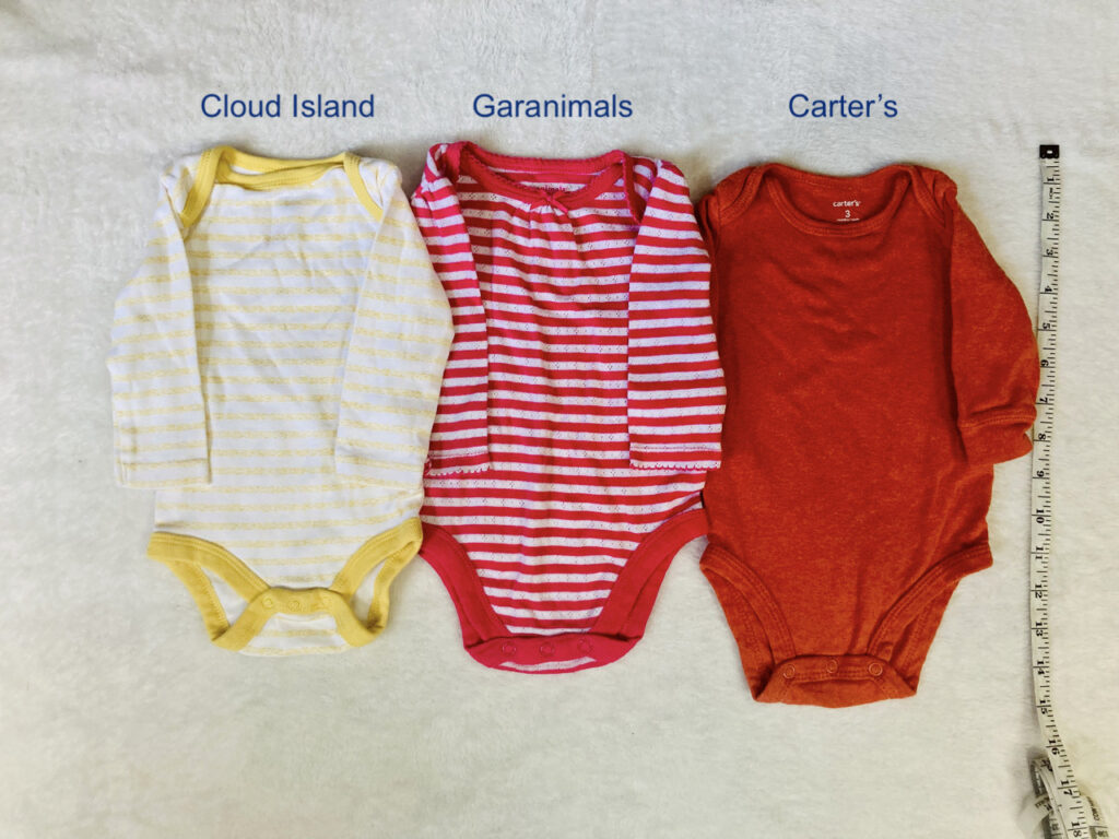 three brands of 0-3 month size onesies: cloud island, garanimals and carter's