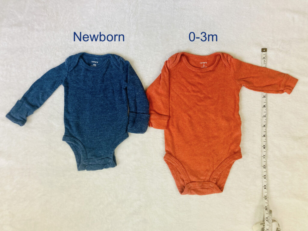 newborn vs. 0-3 month clothes side by side with measuring tape