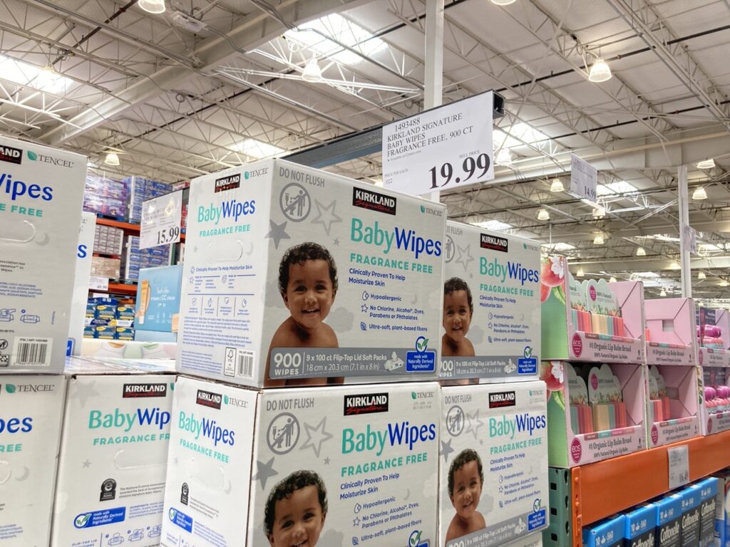 boxes of costco kirkland baby wipes with the price tag in the background