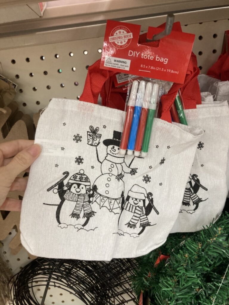 a color your own christmas tote bag with snowmen on it at the dollar tree