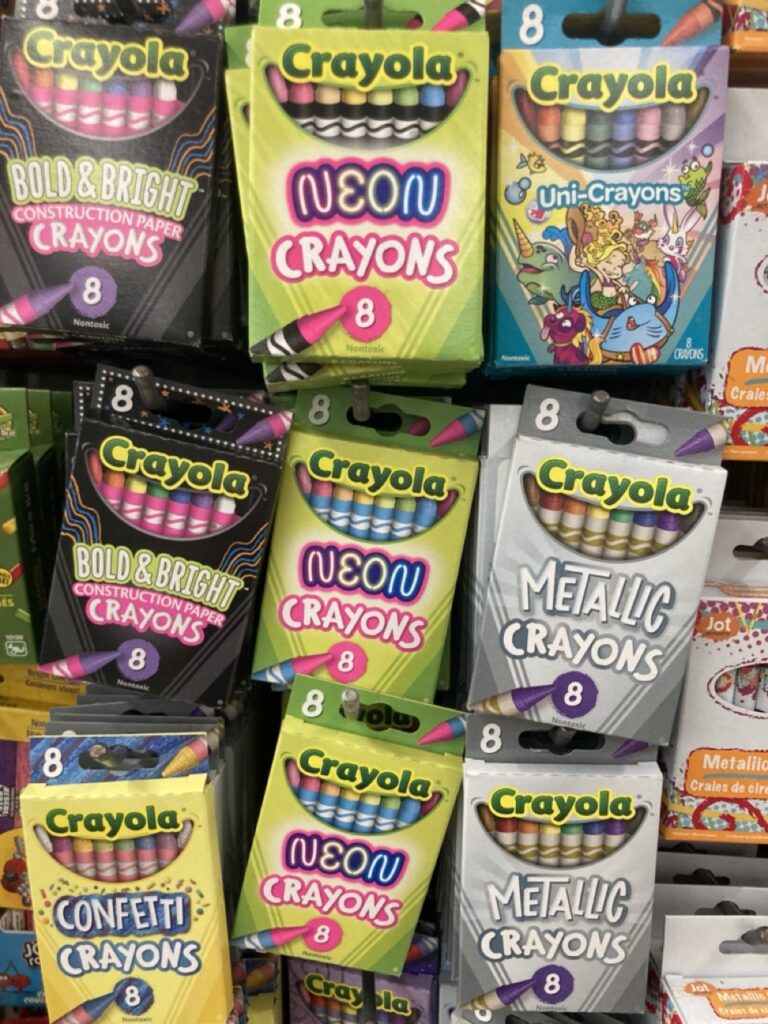crayons hanging on the shelf at a store