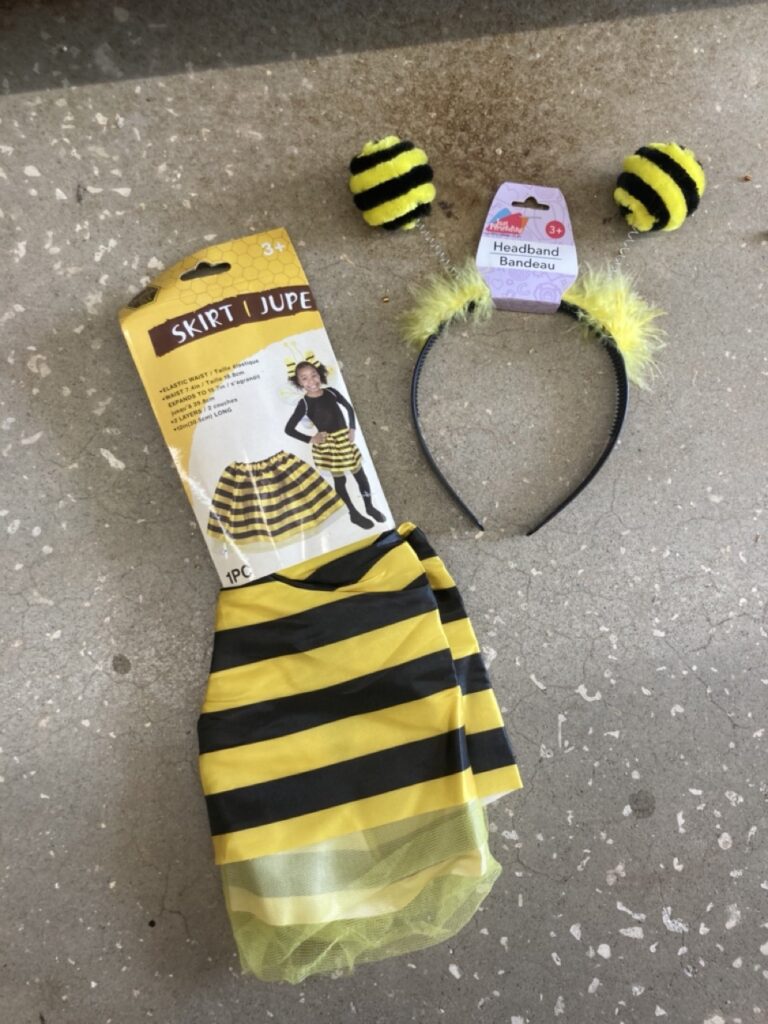 bee costume skirt and antenna with their packaging