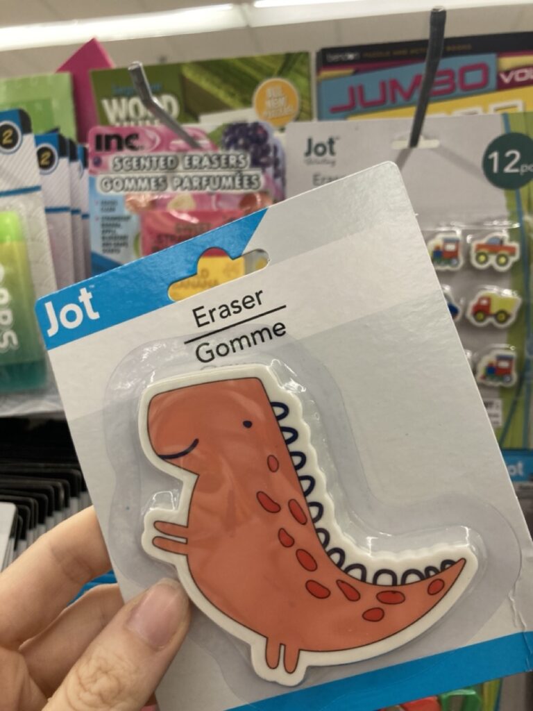 a dinosaur eraser in the package