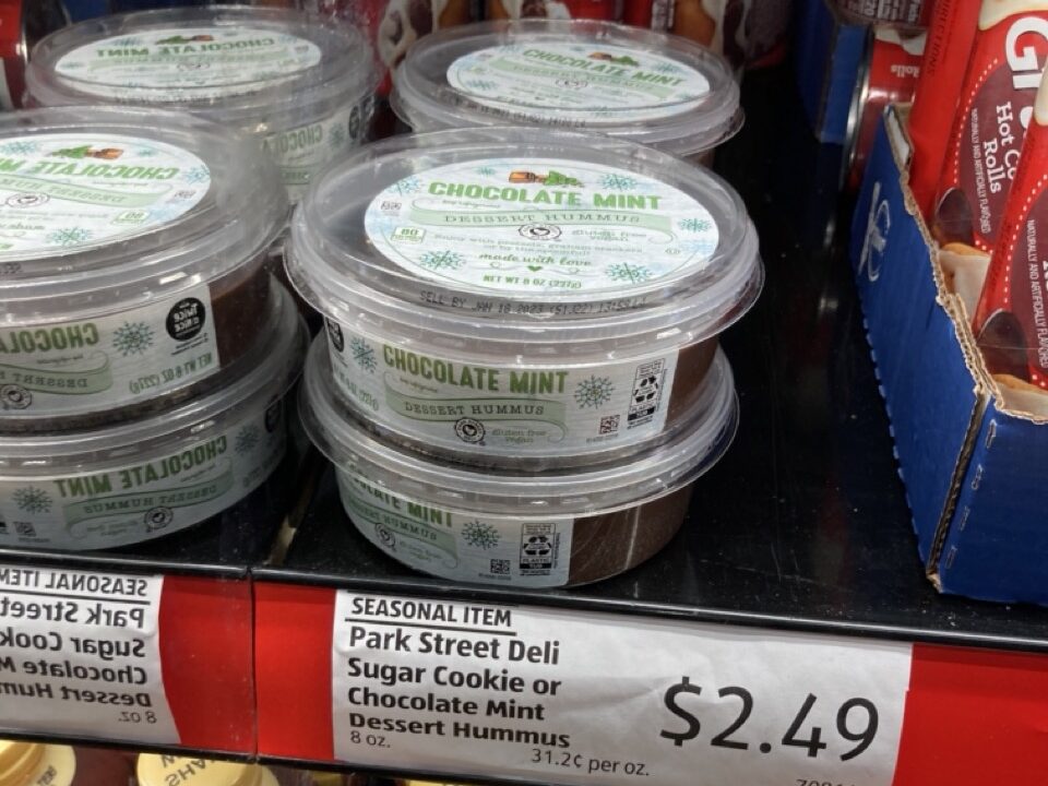 mint chocolate flavor dessert hummus on the shelf with the aldi price tag