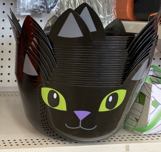 Black cat face shaped bowl on the shelf at the dollar tree