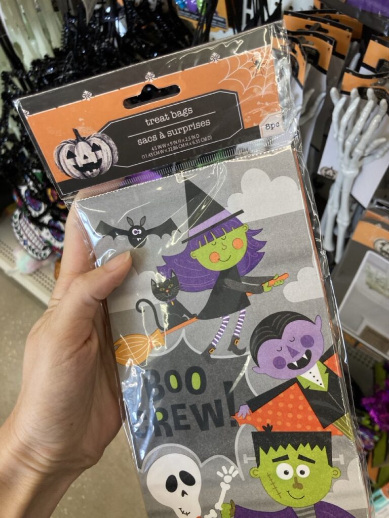 halloween themed goody bag pack with witch, vampire, monster and skeleton on them