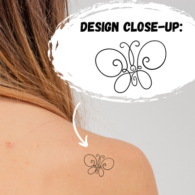 upper shoulder tattoo of a line drawing of a butterfly and a overlay that says "design close-up" with a zoom in on the butterfly design