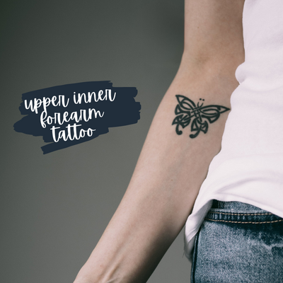 inner upper forearm butterfly tattoo