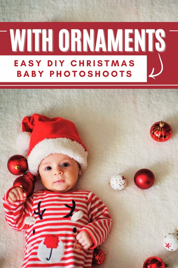 baby in red and white strip pjs and santa hat with ornaments around them