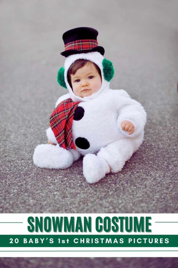 baby in a very plumb snowman costume sitting on the ground