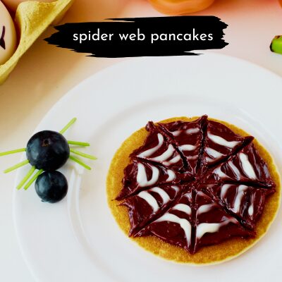 pancake made to look like a spider web with frosting