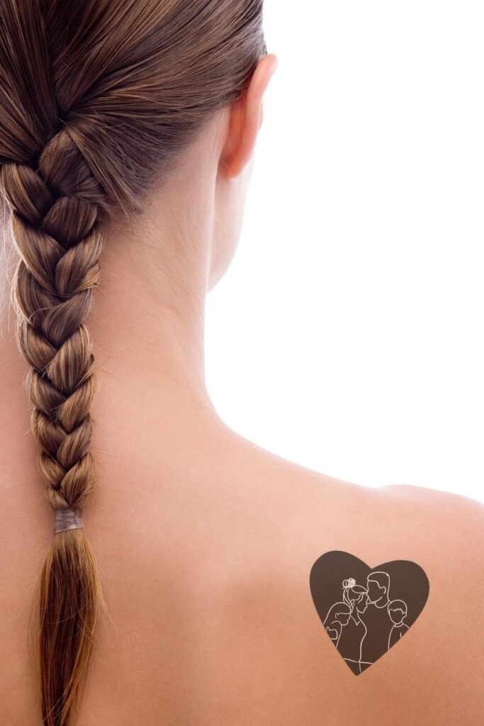 Family heart shaped tattoo on the shoulder.