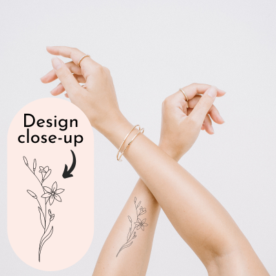 Flower stem on arm tattoo.