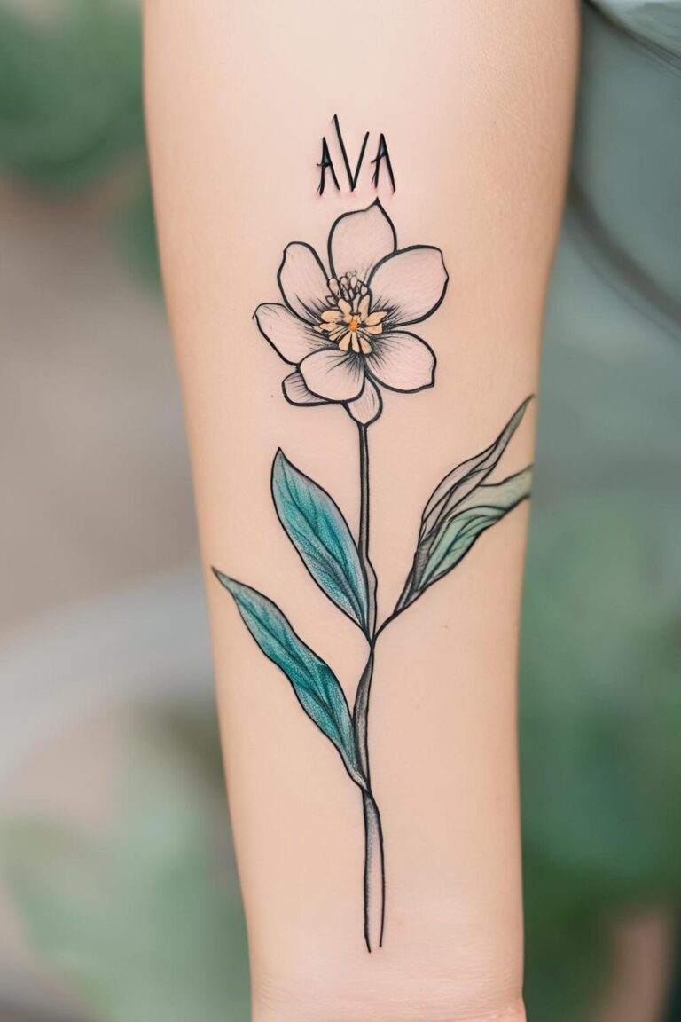 Tattoo flower with grandchild's name.